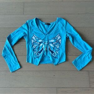 long sleeve butterfly top
brand shein
size small
good condition